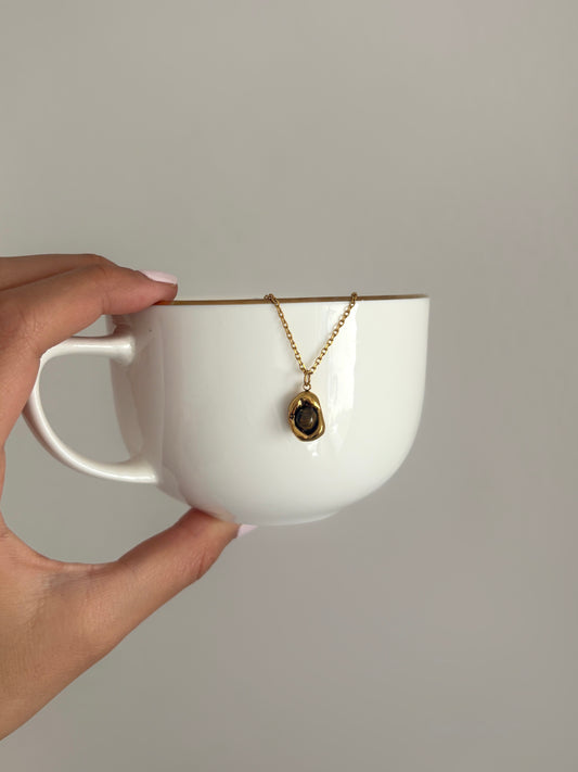 collar ojo de nido